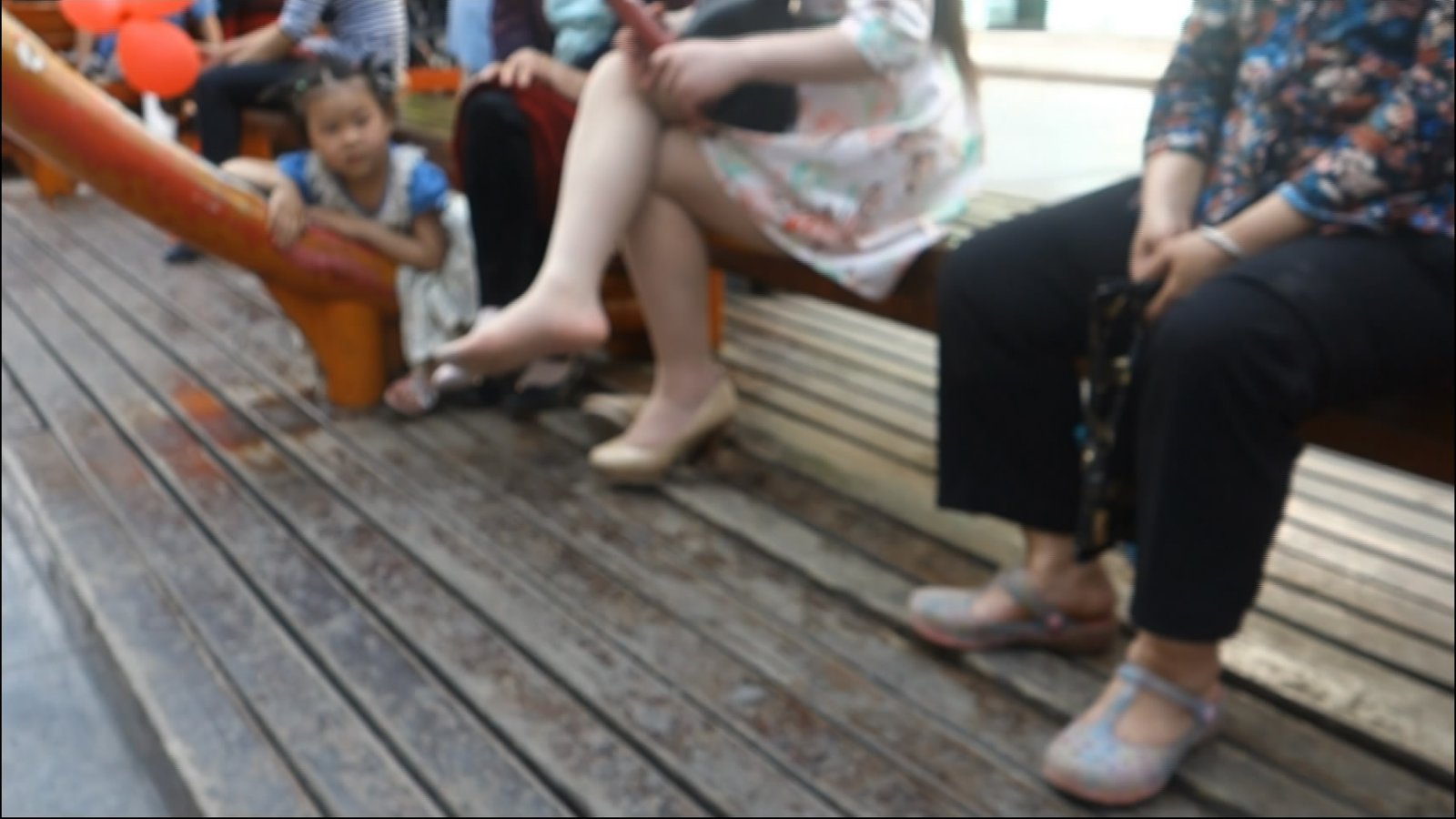 Tired dangling women in public space